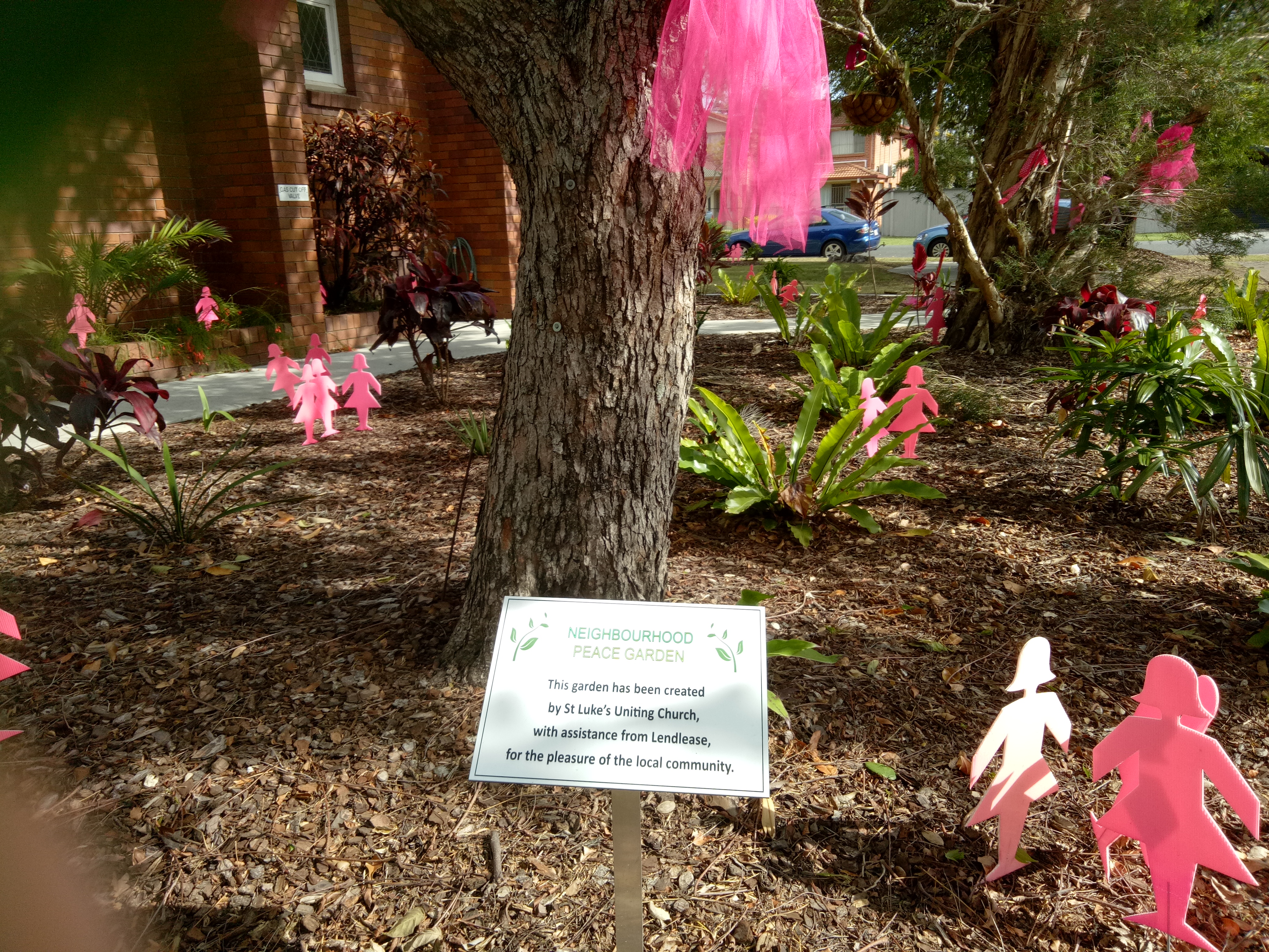 Going pink in the Community Peace Garden for breast cancer awareness
